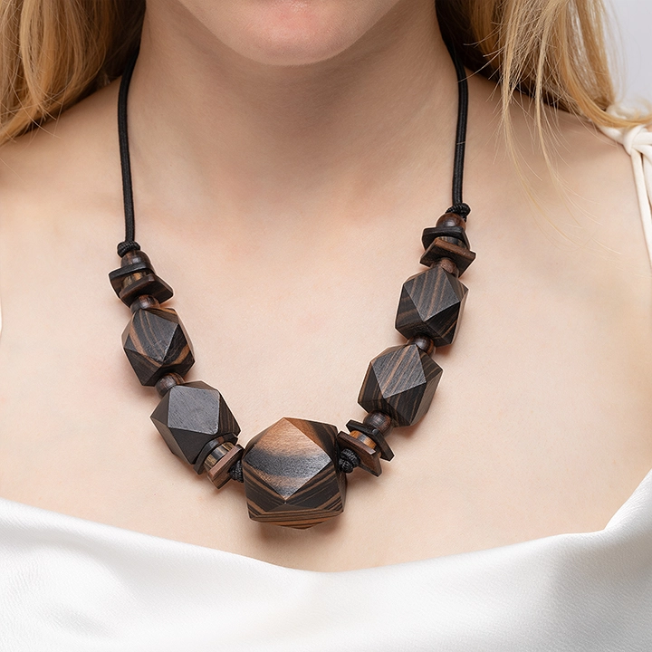 Ta Mon Necklace handcrafted Jewelry for women, styled in an interior