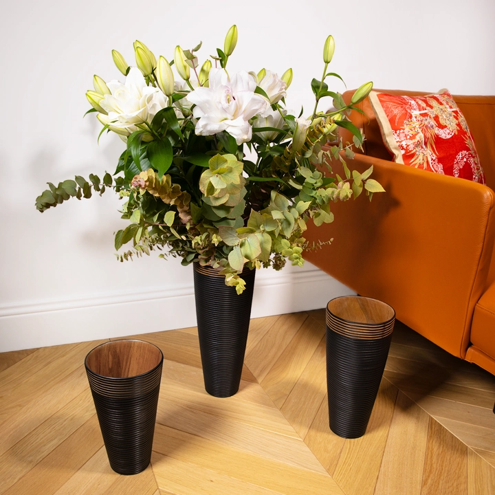 Black beauty handcrafted Vases, styled in an interior
