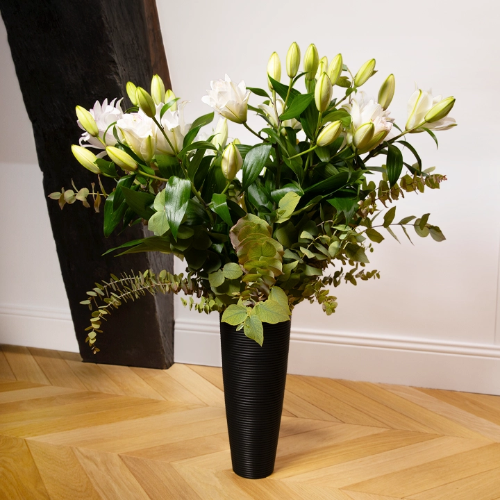 Black beauty handcrafted Vases, styled in an interior