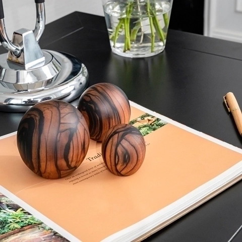 Nora handcrafted Paperweights & Stands, styled in an interior