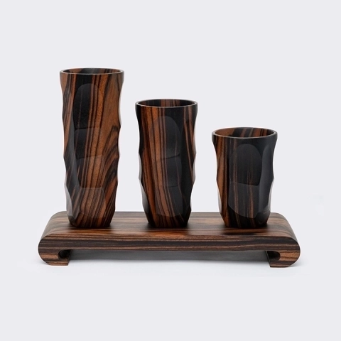 Studio picture of black and red Hammered Cone Cup set of three 