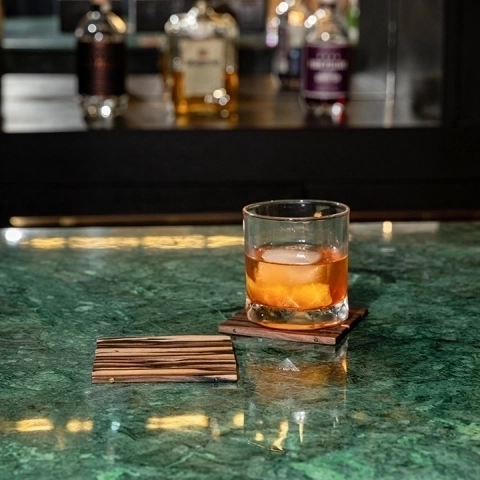 Kyra handcrafted Placemats, Coasters & Wine Buckets, styled in an interior