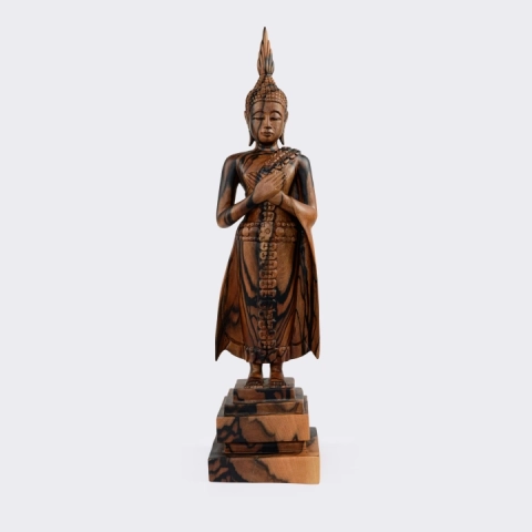 Studio shot of the Buddha sculpture.