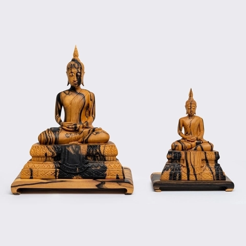 Studio shot featuring a set of Buddha' Sculpture.