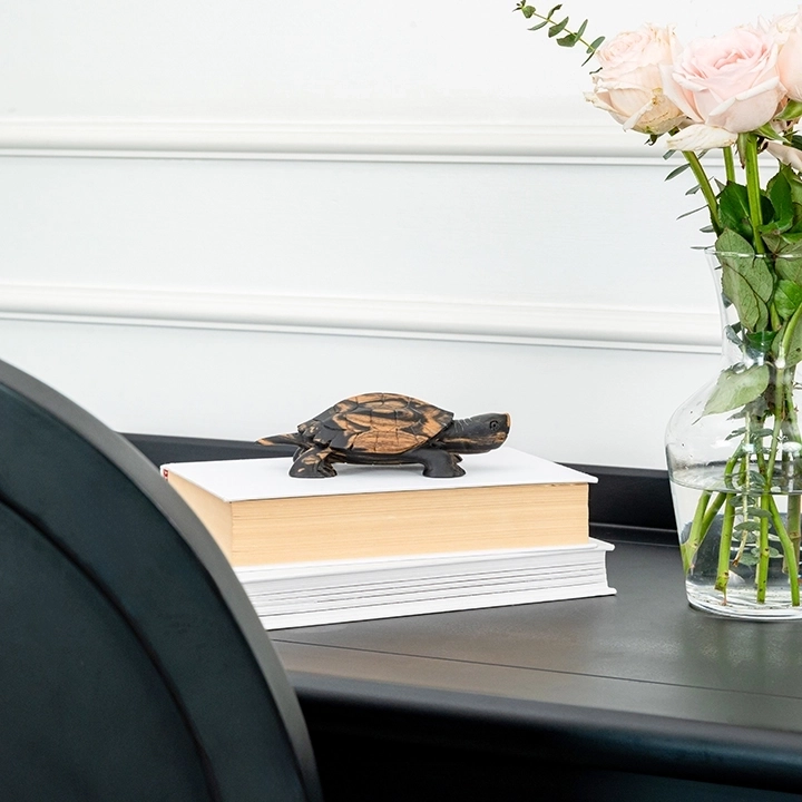 Keeled handcrafted Animal Sculptures, styled in an interior
